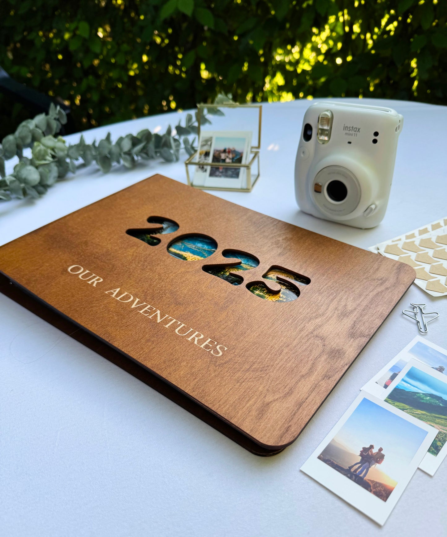 Personalized wooden photo album with engraved names on cover