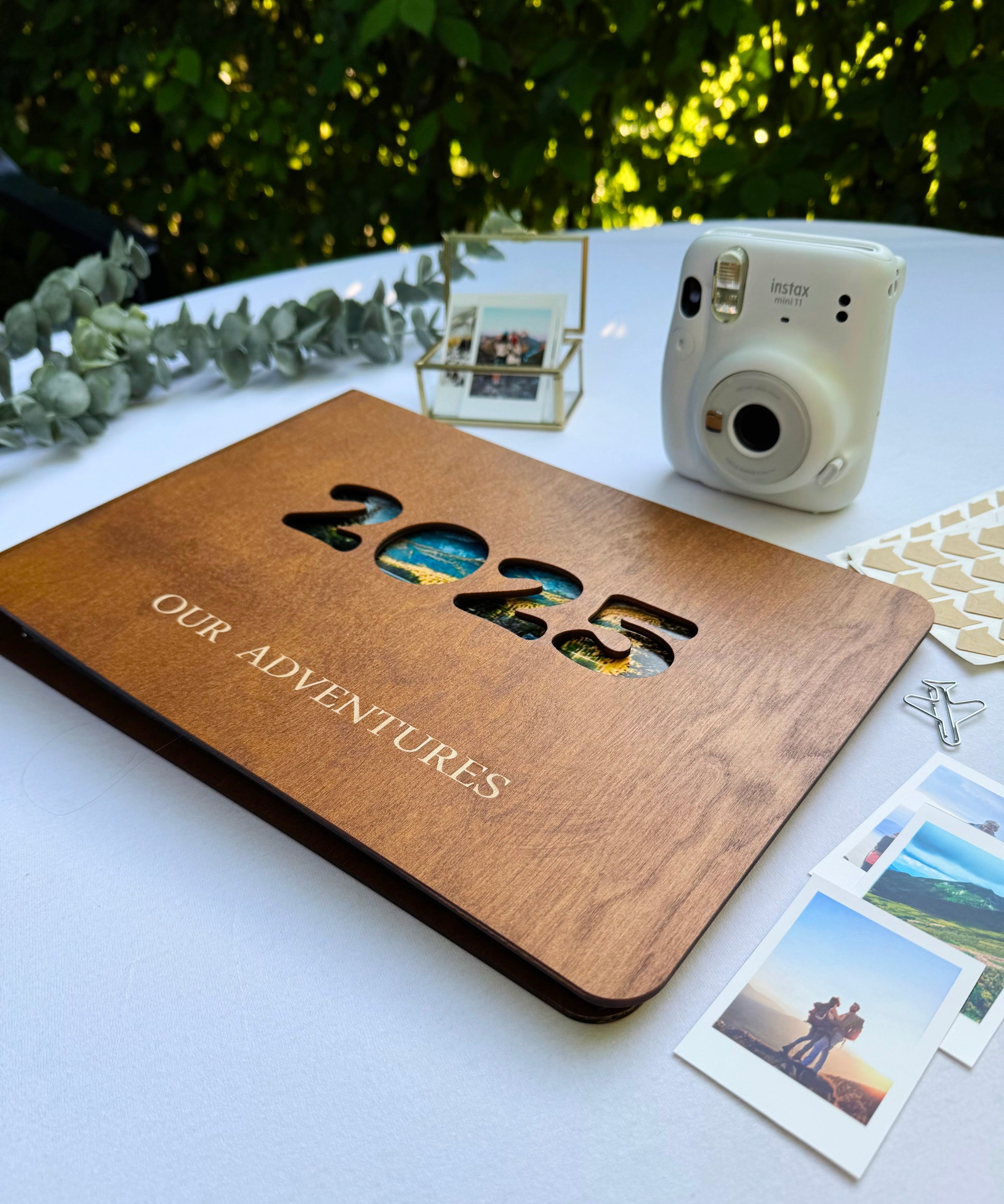 Personalized wooden photo album with engraved names on cover