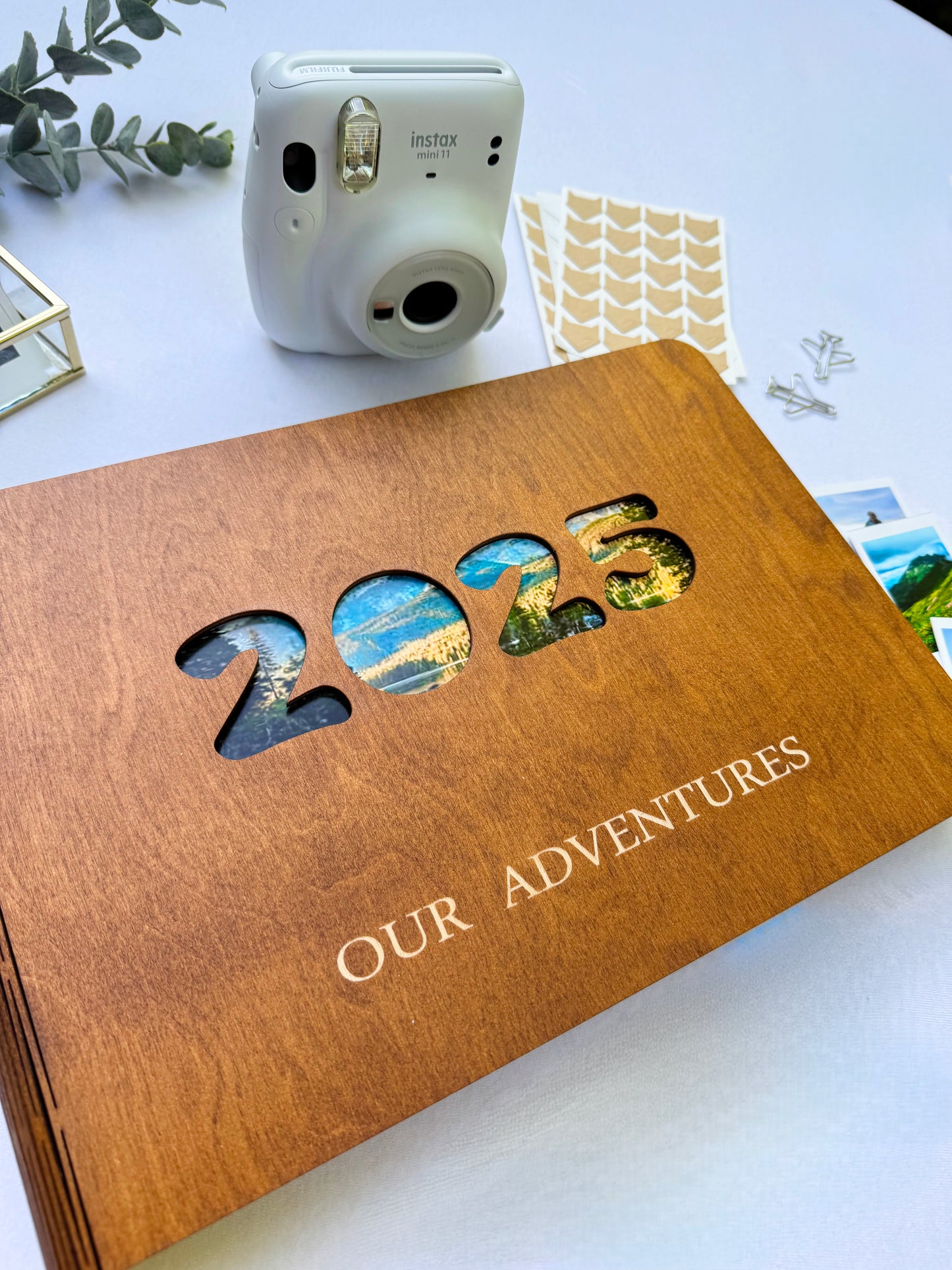 Personalized wooden photo album with engraved names on cover