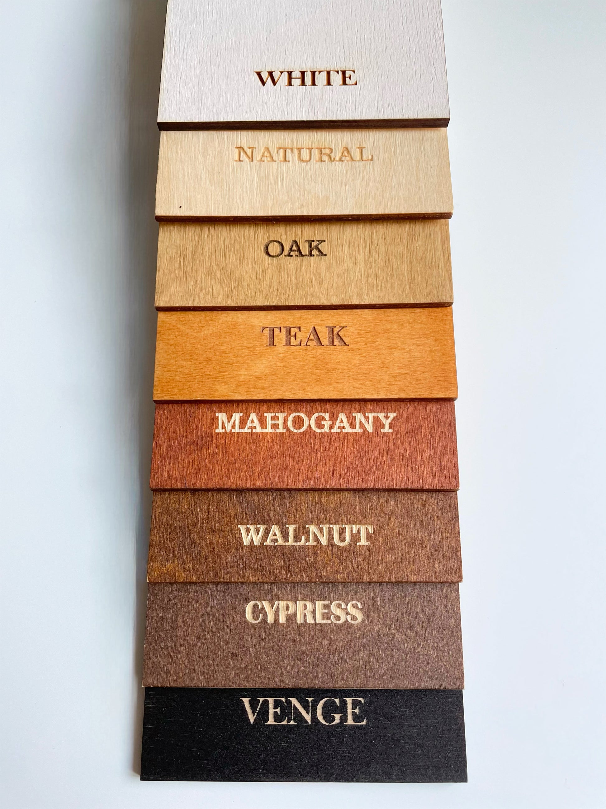 Wood color swatch chart with labeled wood finishes on a white background