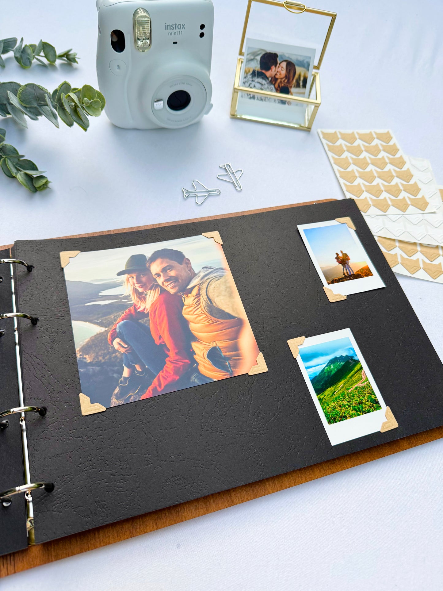 Personalized wooden photo album with engraved names on cover