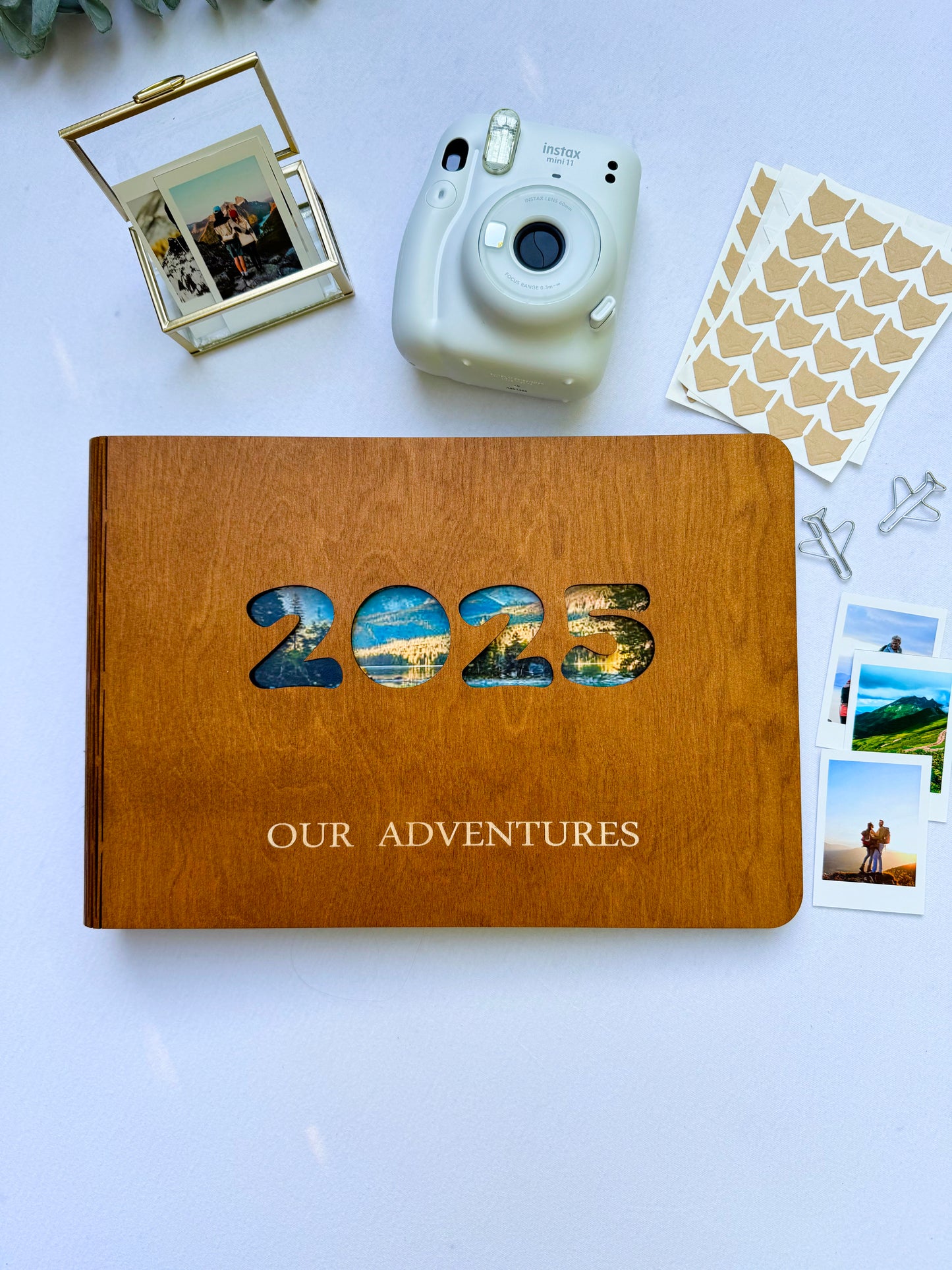 Personalized wooden photo album with engraved names on cover